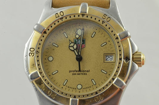 7330098