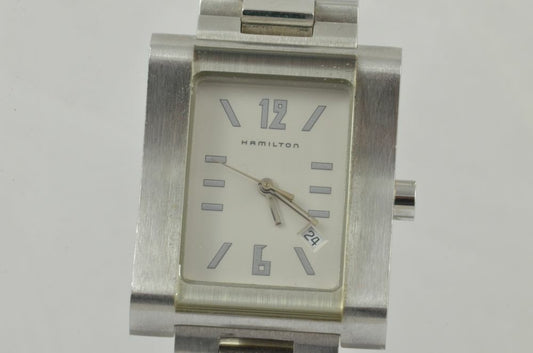7330047
