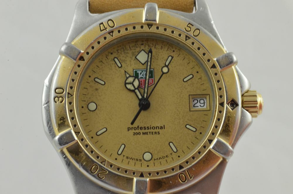 7330098