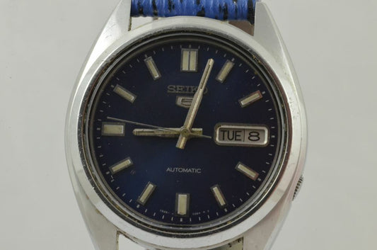 7695439