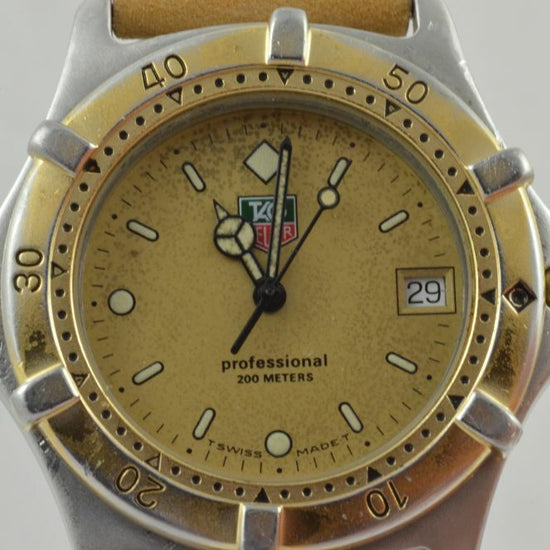7330098