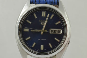 7695439