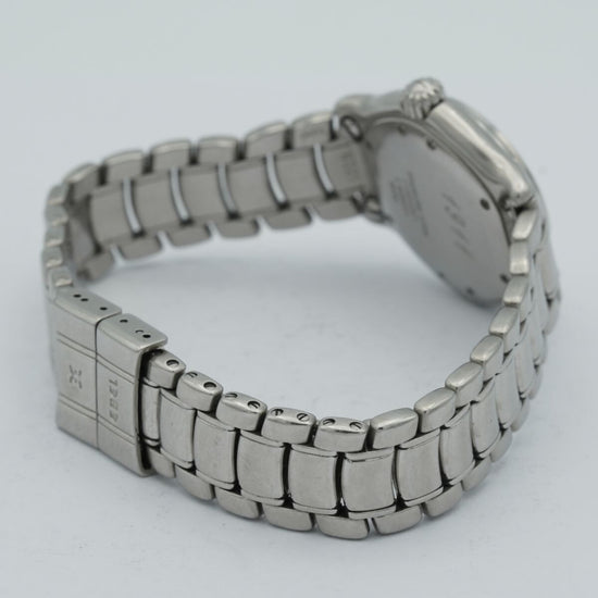 7205900