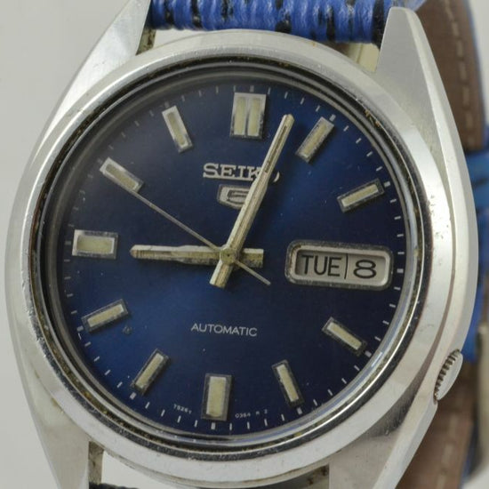 7695439